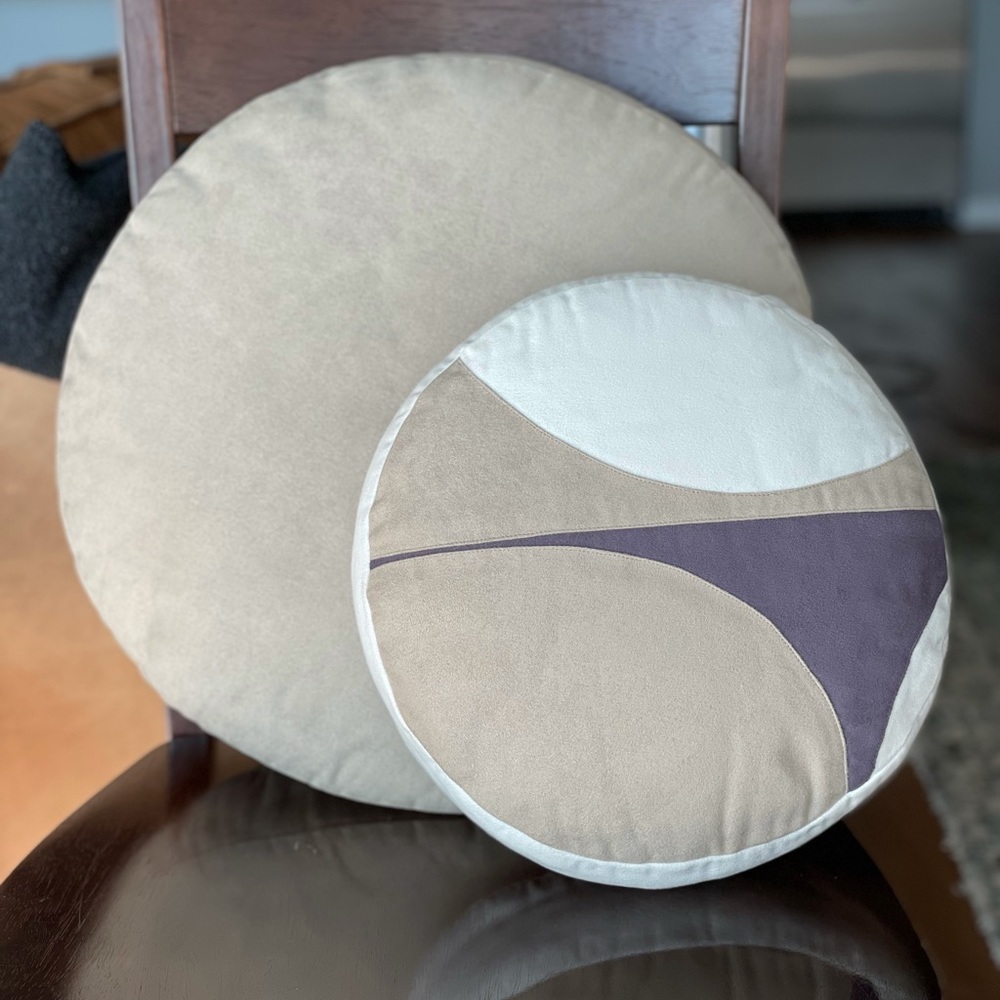 West Elm round decorative pillows (2)